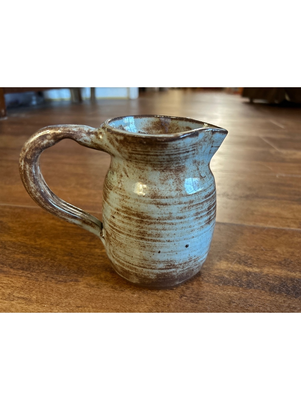 Handcrafted Ceramic Pitcher with Brown and Cream Glaze